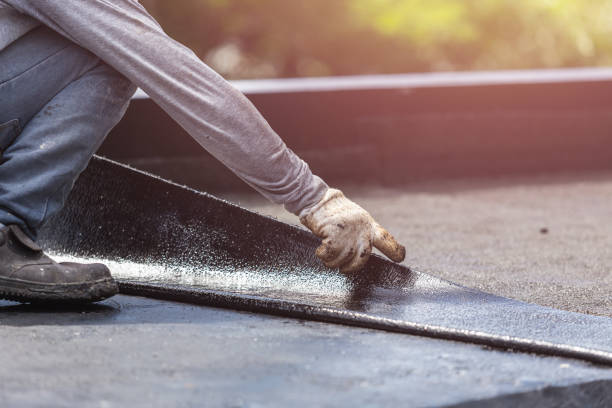 Professional Basement Waterproofing technician working in Englewood, NJ